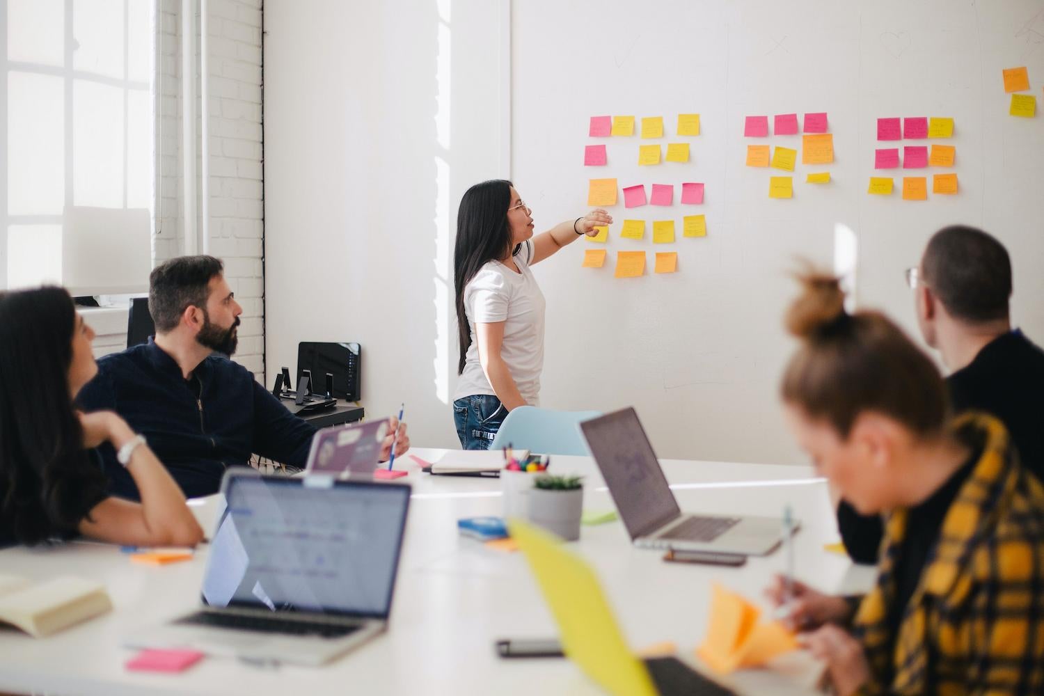 people at the office discussing project scope